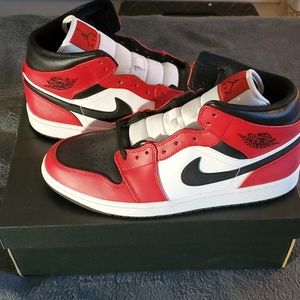 Jordan 1 mid black toe.